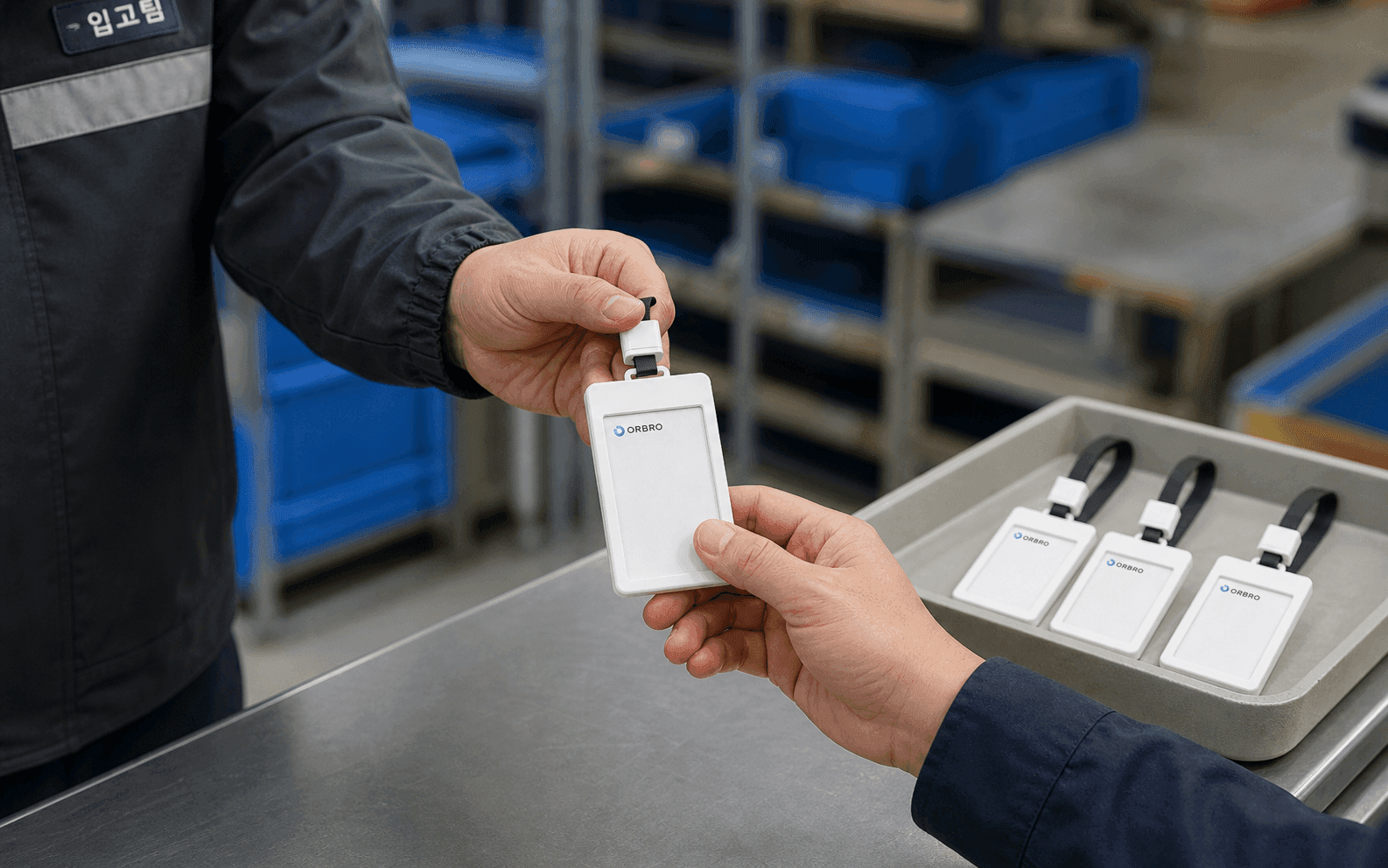 Supervisor handing a badge type tag to a worker at shift change